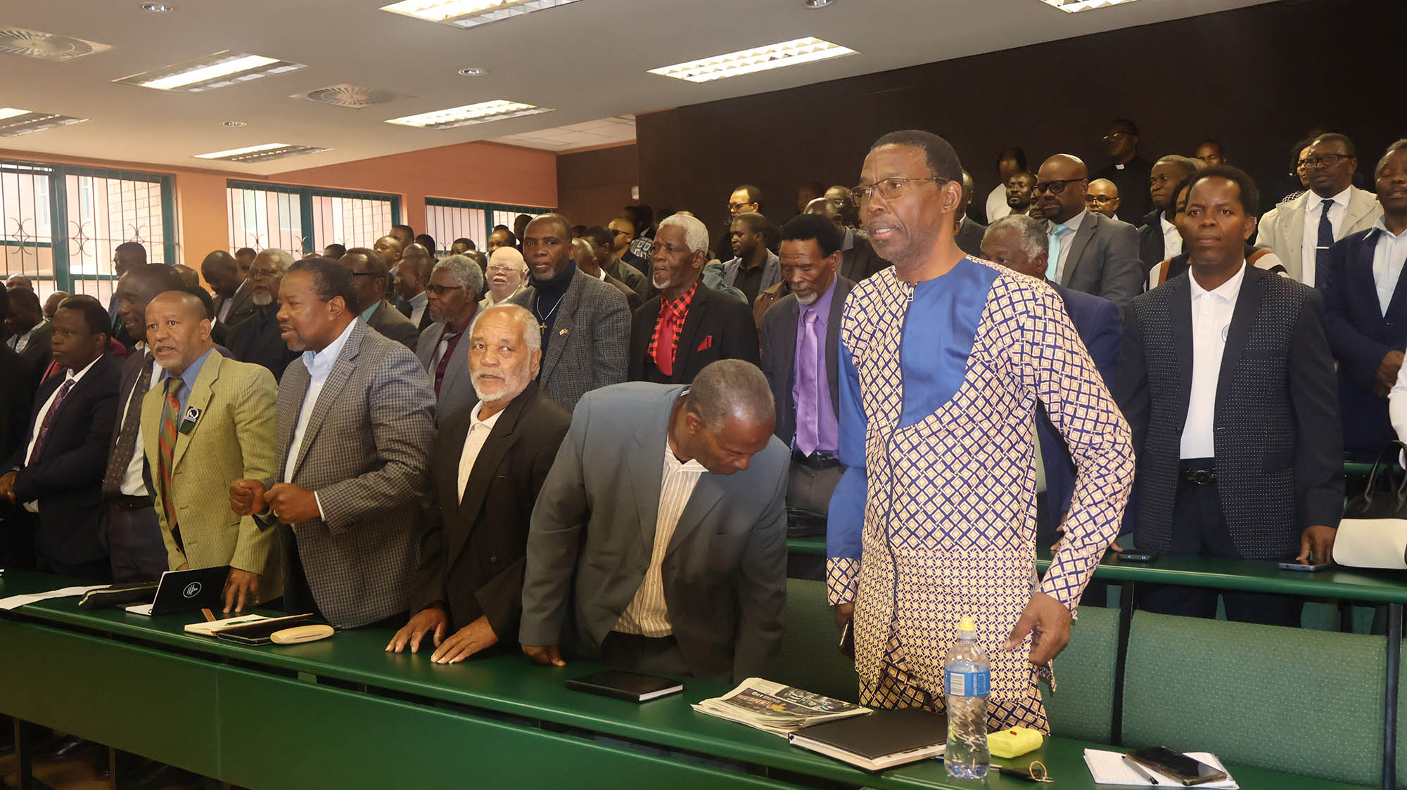 Pastors from the different denominations around the country in song before the consultation meeting with the Ministry of Home Affairs on the religious institutions policy. 